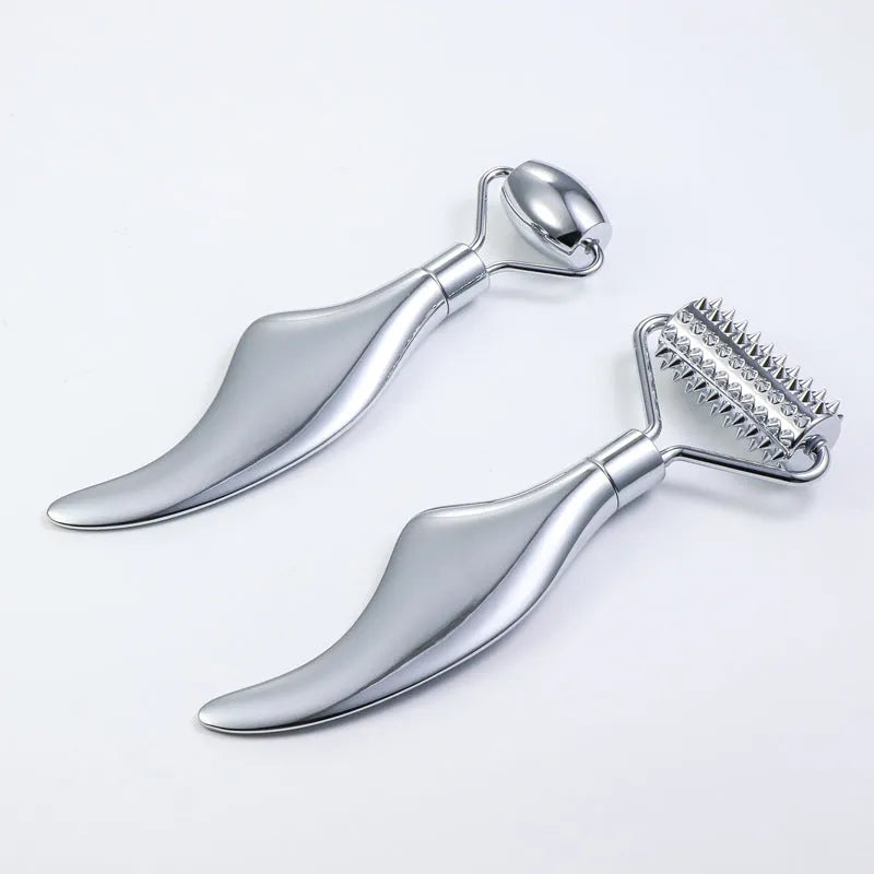 Stainless steel facial massage board with double-headed roller and heart-shaped eye poking stick