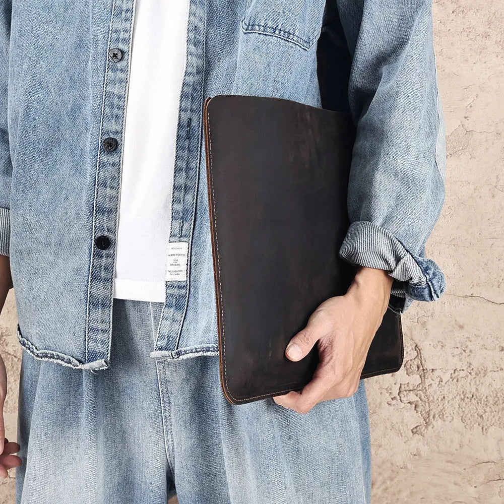 Men's brown crazy horse leather computer liner bag showing solid colour design and genuine leather construction