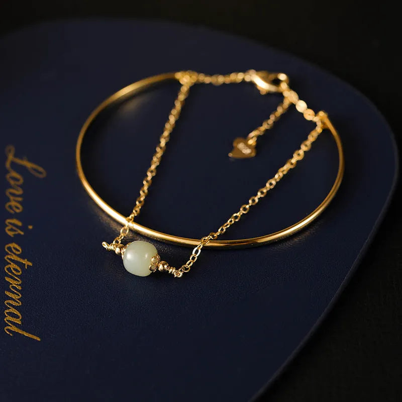 Hetian jade lucky beads bracelet with gold inlay treatment in women's fake two pieces style