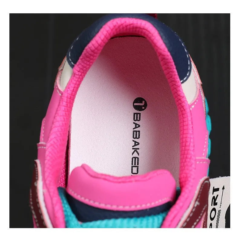 A pair of thick-soled leather sports casual shoes with a wedge heel and round toe in a lace-up design.