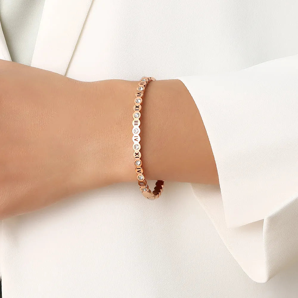 Korean style titanium steel bracelet with electroplated gold rose gold or steel finish and number charms