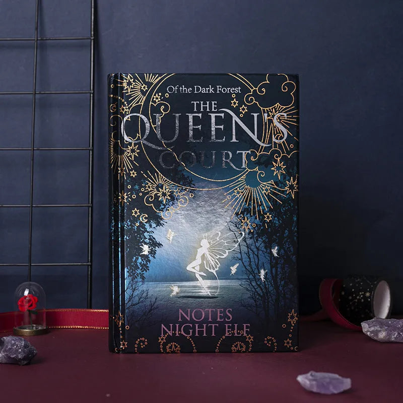 Blue and purple A5 hardcover notebooks with luminous fluorescent covers, open to show full-colour illustrated pages.
