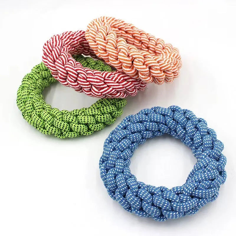 Cotton braided ring dog chew toy approximately 18cm in diameter with knot details