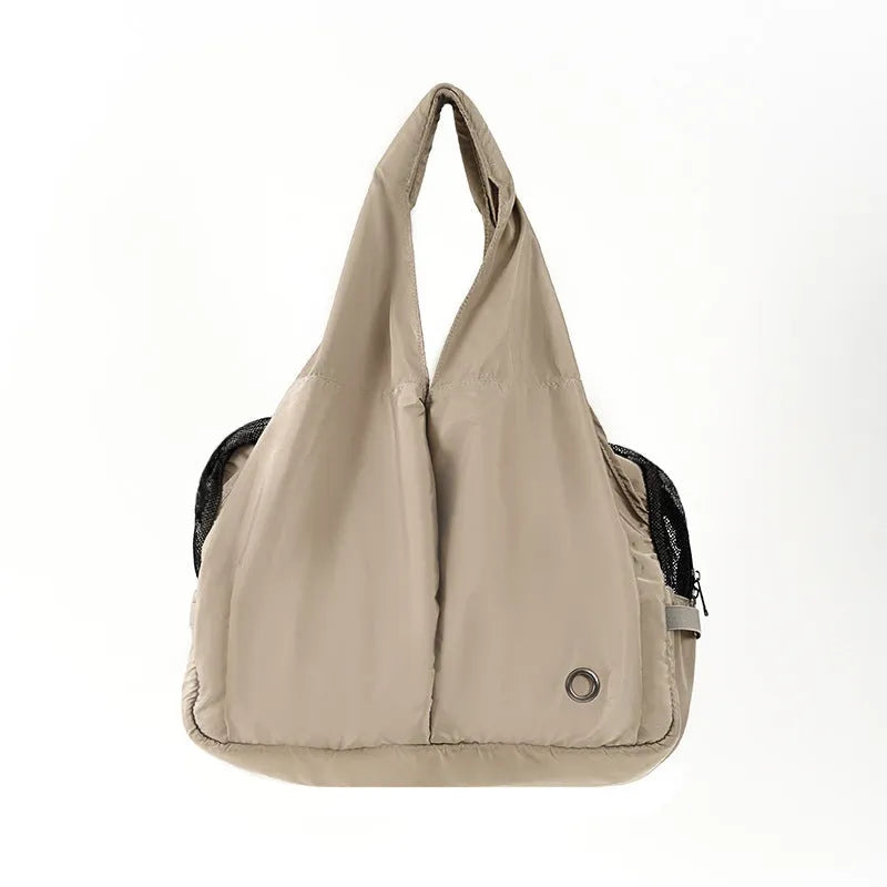 Apricot cloth pet carrier bag measuring 41x16x28cm with handbag-style design