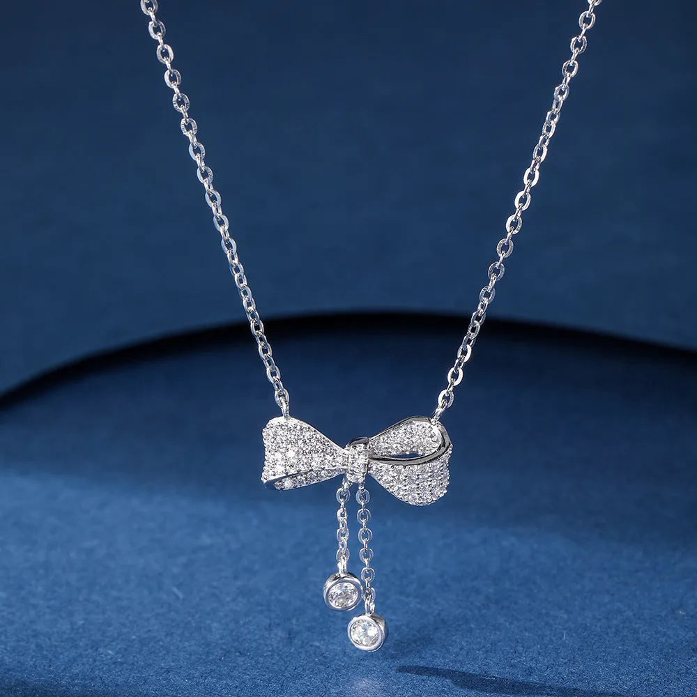 S925 sterling silver bow pendant necklace with adjustable chain for women