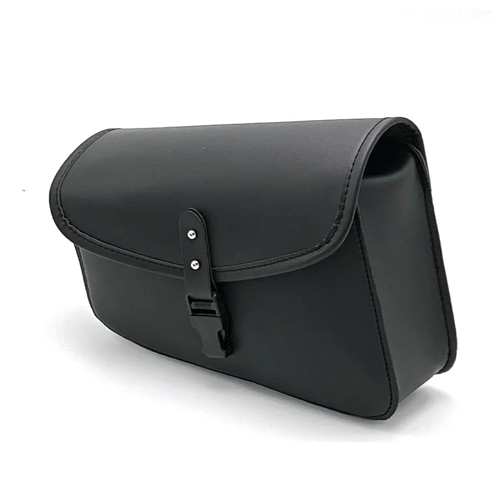 Black motorcycle swingarm saddlebag mounted on a Sportster, showing its size and side-mounting position.