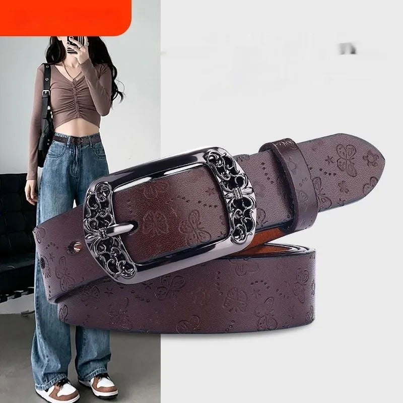 Thin black women's PU leather jeans belt with an alloy double-buckle fastening.