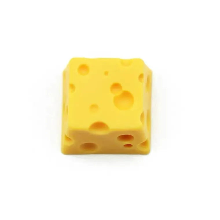 Yellow resin cheese design keycap for mechanical keyboards with Cherry MX switches.