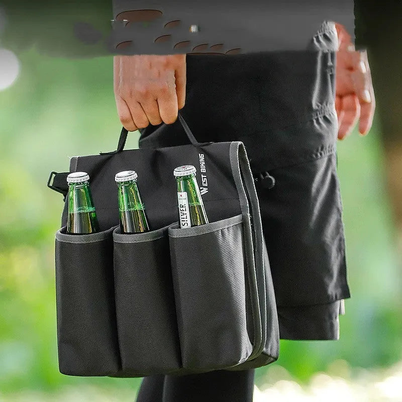 Black and orange bicycle handlebar bag for two drink bottles, made from 600D PVC material.