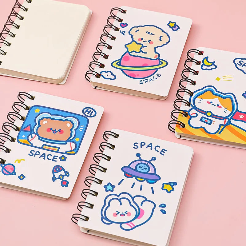 Astronaut-themed flip notebook in pocket size 10.5 by 8 cm with space cat cover design.