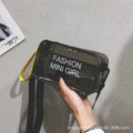 Transparent square jelly shoulder bag in multiple colours with an adjustable long strap.