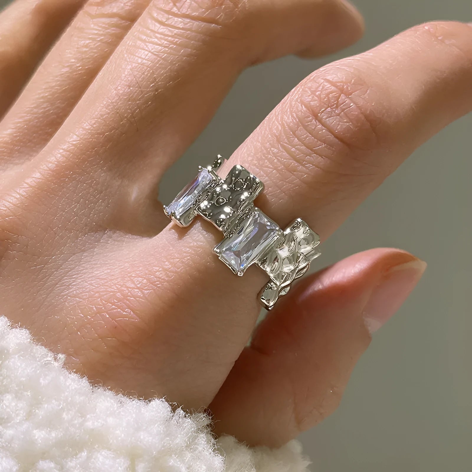 Silver geometric open ring with zircon stone setting and three-dimensional decoration