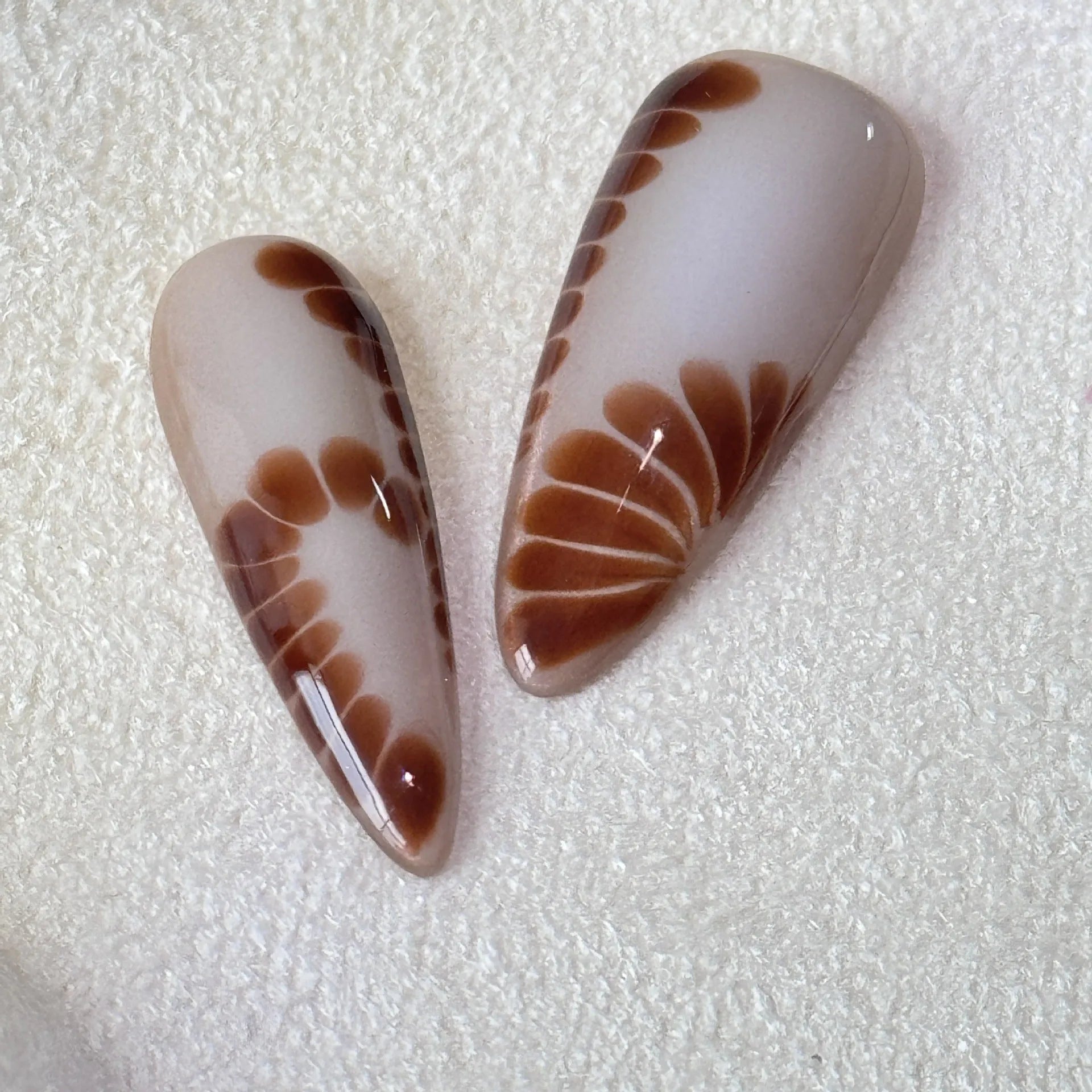 Handmade French style leopard print nail armour stickers with cross and flower patterns.