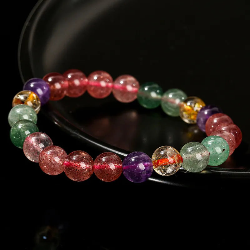Natural strawberry quartz and tourmaline geometric bead bracelet for women in 7mm, 8mm, and 9mm sizes.