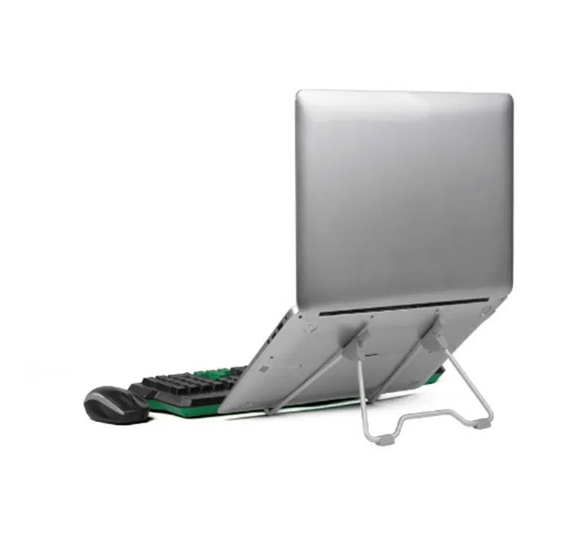 Grey adjustable angle aluminium alloy and plastic stand holding a mobile phone and a laptop on a desk.