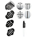 Golf scriber putter alignment tool set with plastic scribers and drawing pens on a practice green.