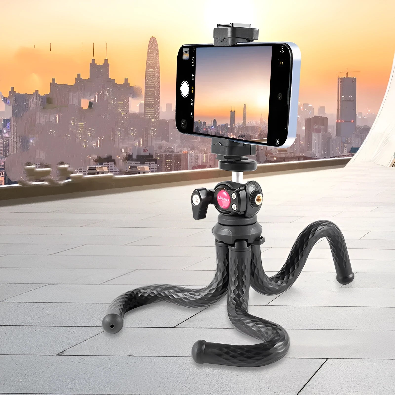 Black octopus-style flexible tripod and phone clip set on a white background.