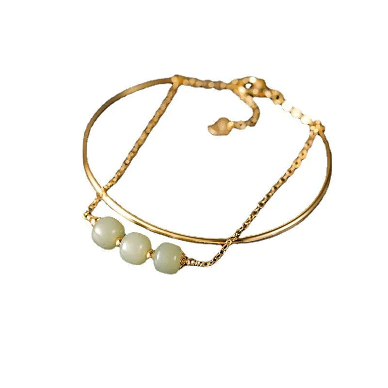 Hetian jade lucky beads bracelet with gold inlay treatment in women's fake two pieces style