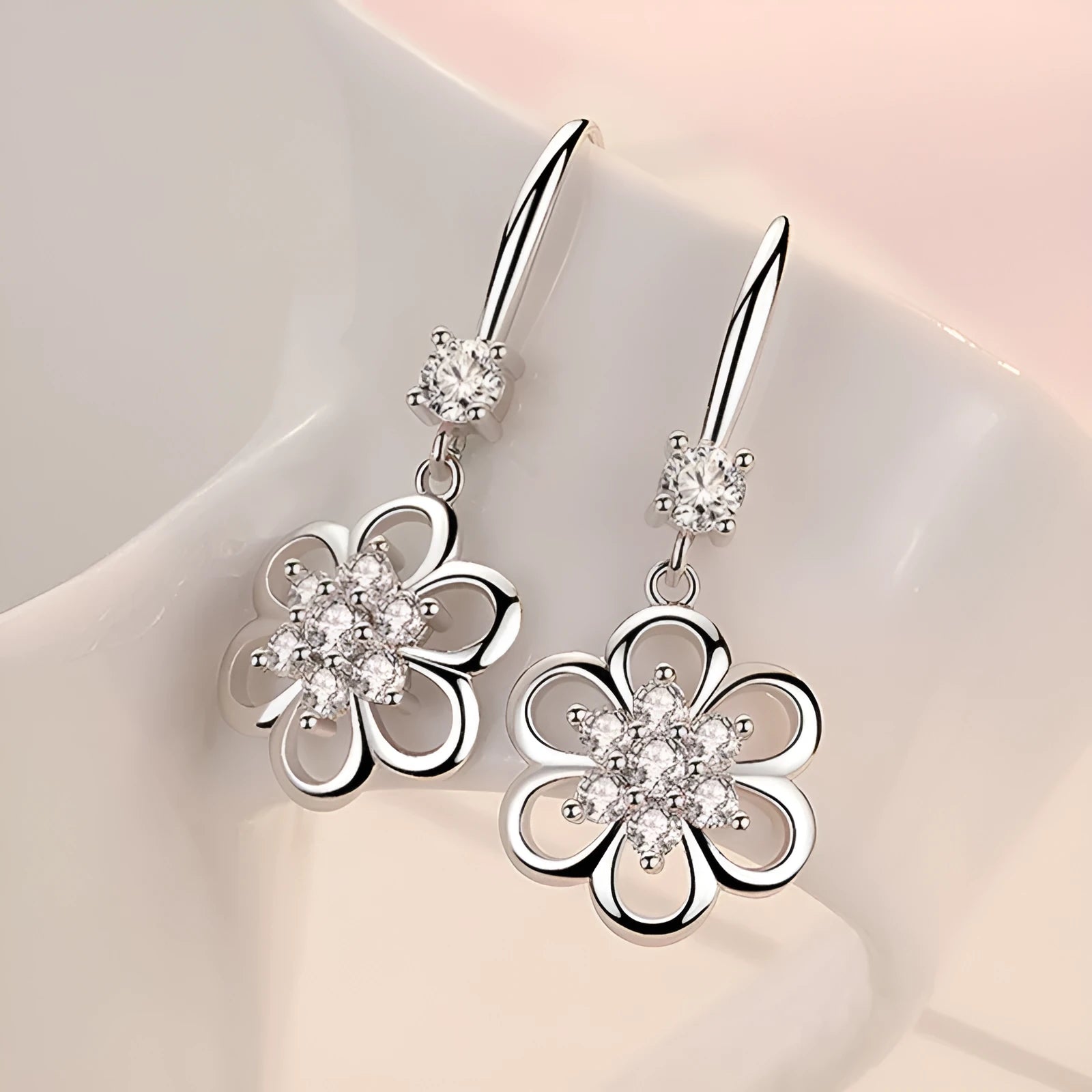 Floral white copper earrings with faceted stone accent, available as ear stud or ear hook in purple or white colour options