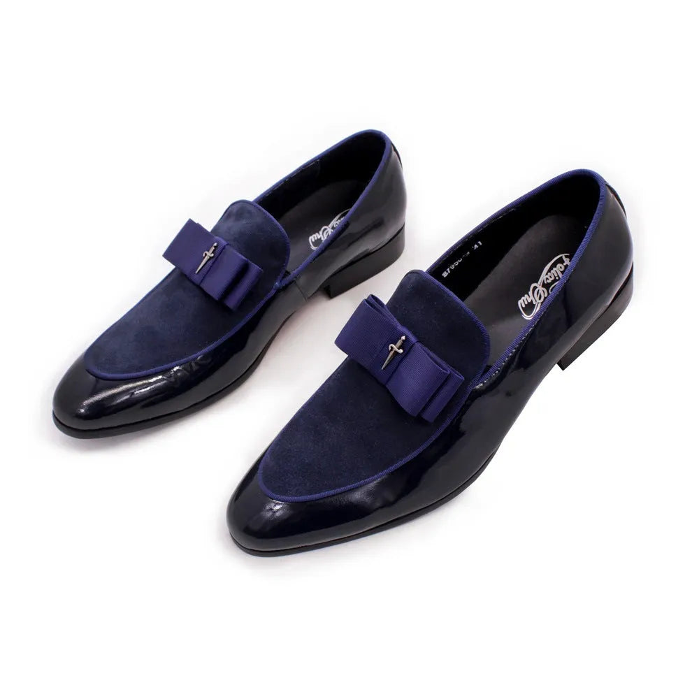 Men's glossy black patent leather low-top shoes featuring a gold tassel detail on a white background.