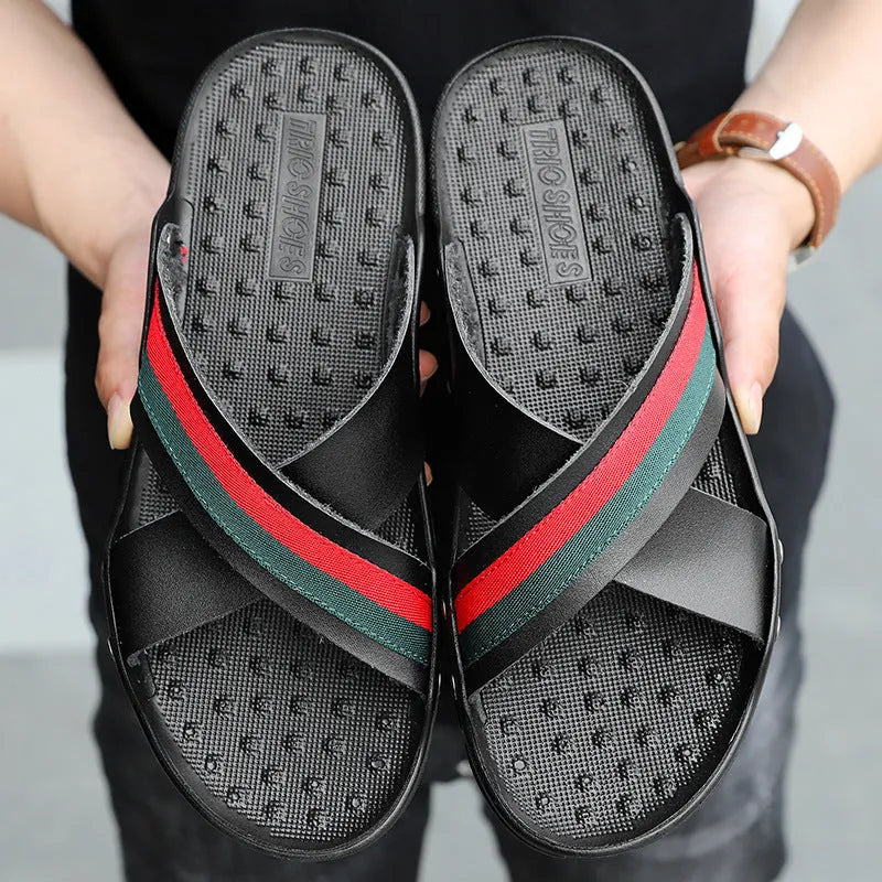 Men's white, blue, and black cowhide flip-flop sandals with PU sole on a plain background.
