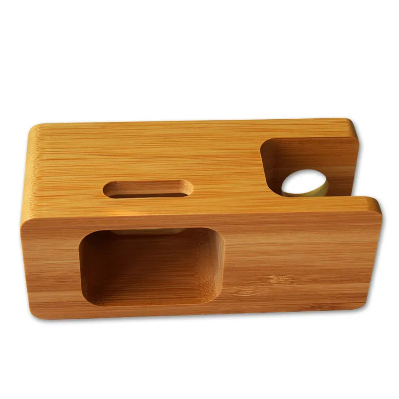 Bamboo phone and watch stand with carved design measuring 149mm wide