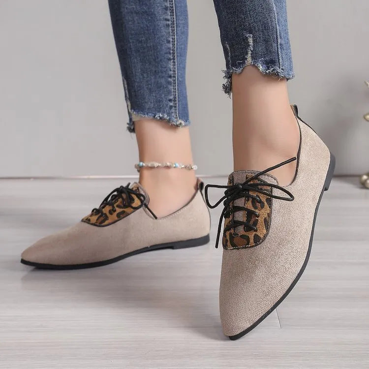 Beige leopard print women's pointed toe pumps with rubber sole in extended sizing
