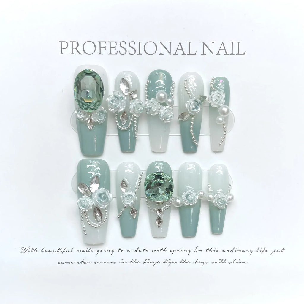 Green armour coloured full nail set with Camellia flower gradient chain, bow, and butterfly designs.