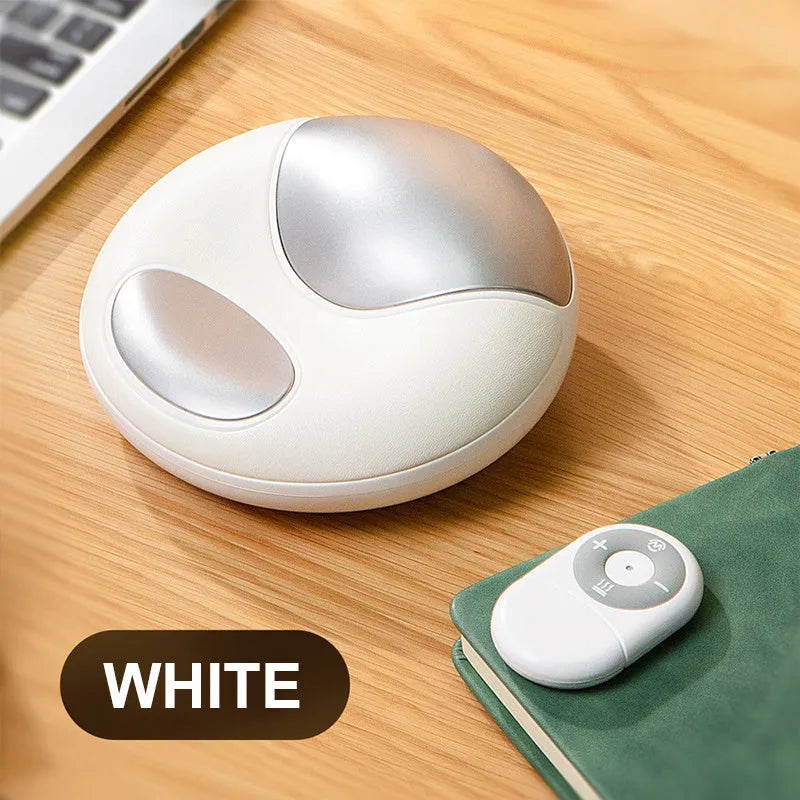 Smart electric hand massager with heat compress in pink and white on desk