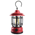 Dark green portable camping lantern with head strap, shown as a headlamp and standalone light for booths.
