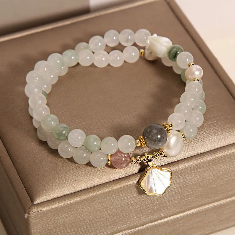 Tianshan Emerald Green Crystal Bracelet with apricot leaf pendant and gold-plated gemstone details