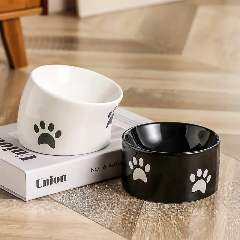 Ceramic cat bowl with high-footed design showing cat's paw decoration pattern in selected colour