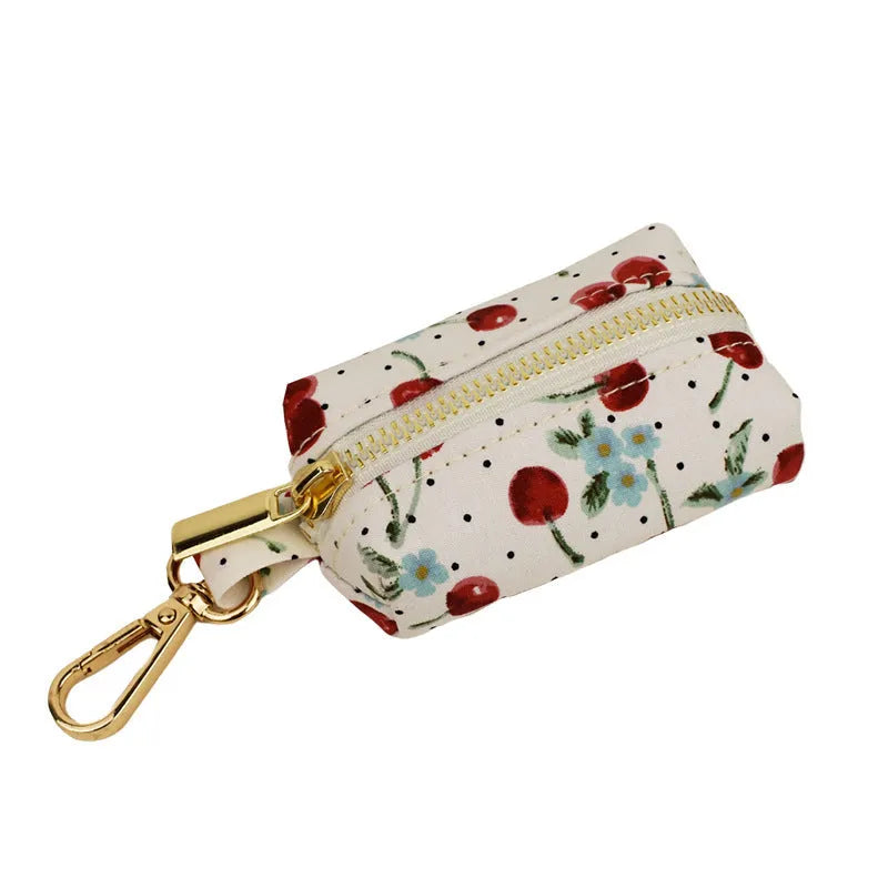 Red cherry printed dog collar and leash set with light gold buckle and decorative bow strap