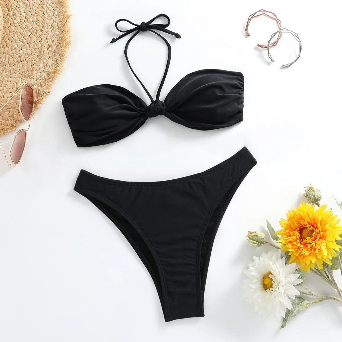 Black women's lace-up bikini top and high-cut briefs swimsuit set