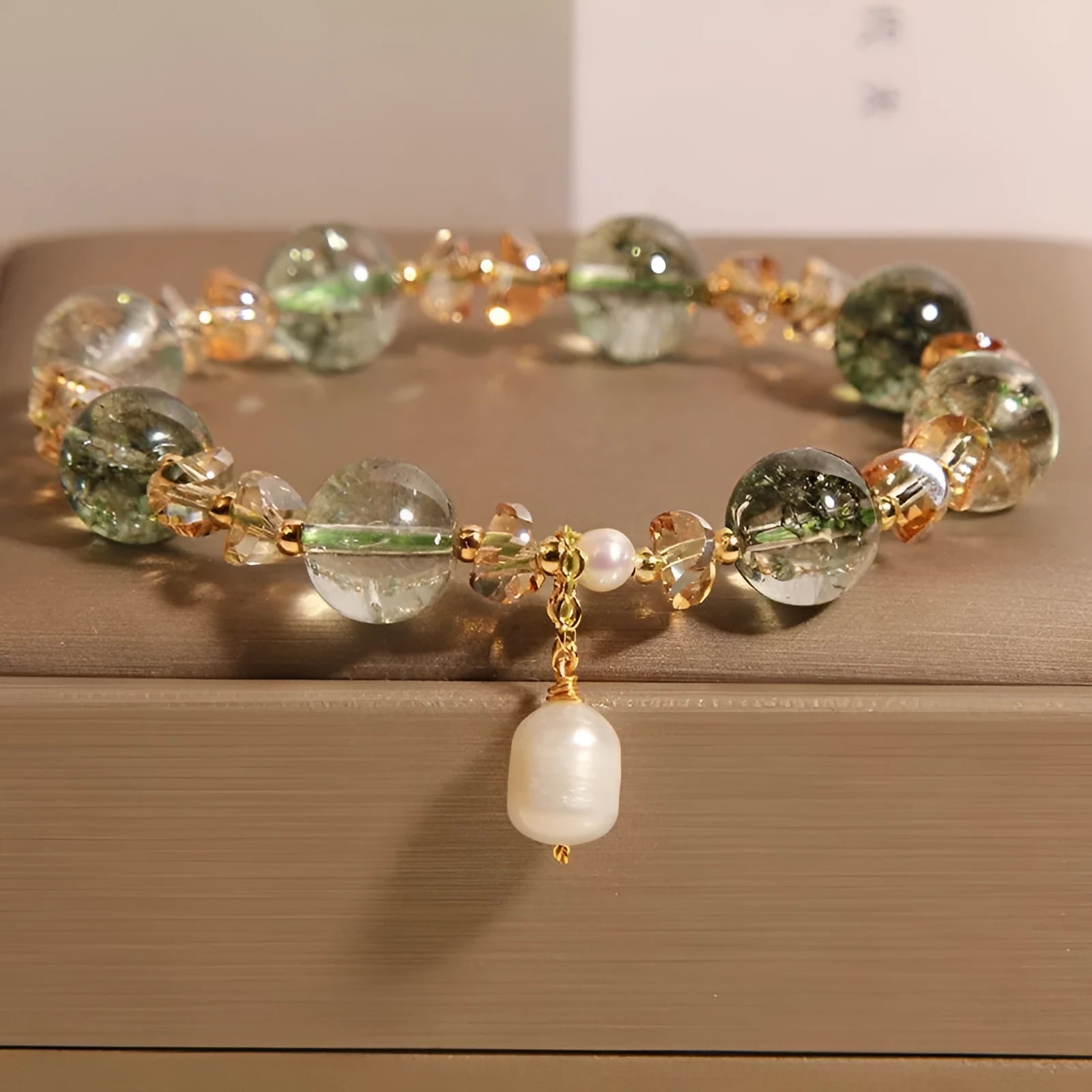 Women's green phantom quartz crystal bracelet with champagne crystals and pearl accents in Japanese-Korean style