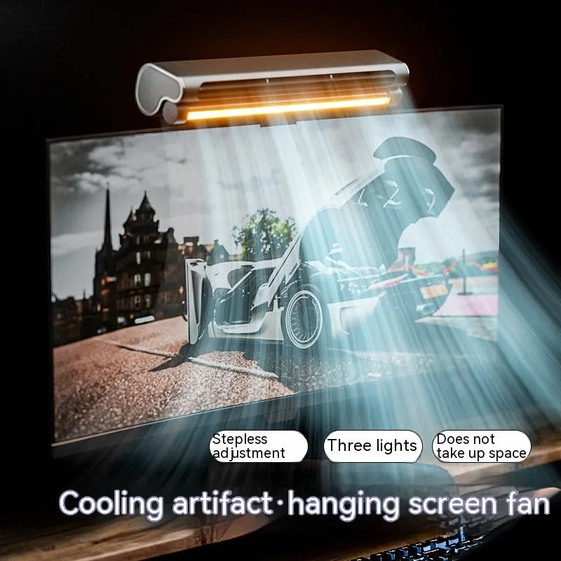 Black bladeless USB fan with clip attached to a laptop screen, showing integrated LED light.