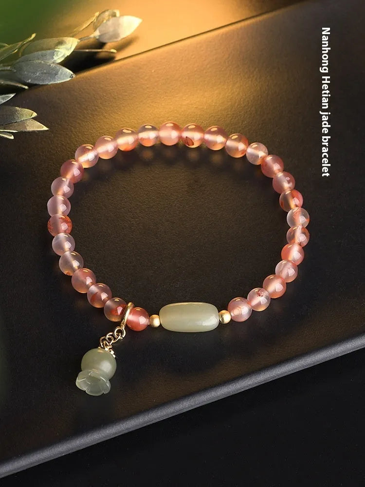 Ice float nanhong agate ethnic bracelet with flower shapes and bamboo joint decorative elements