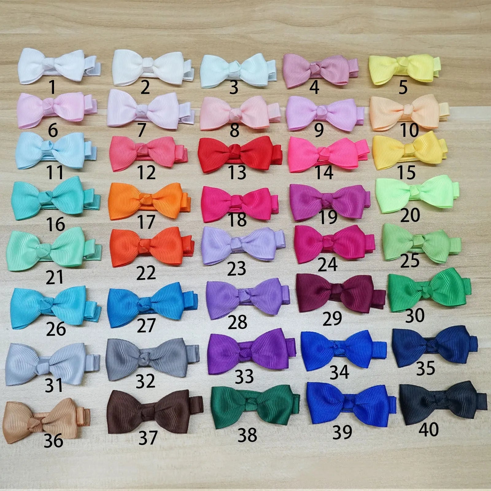 Pastel coloured hair clips, barrettes and bows for babies and toddlers in a set.