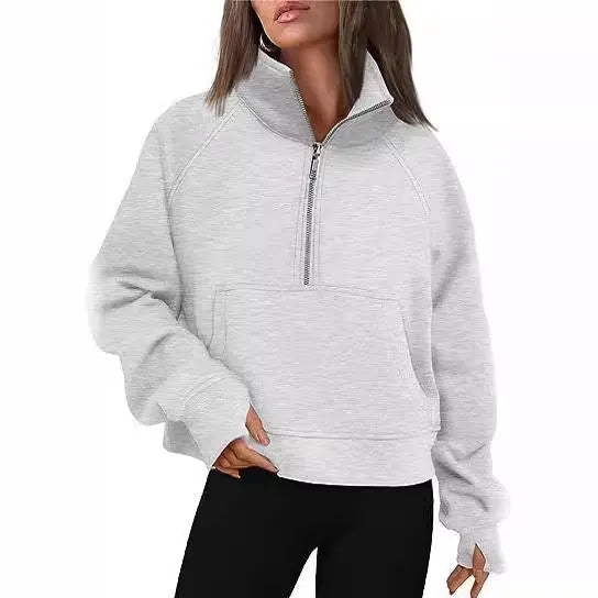 Women's loose lapel fleece-lined sweater in a solid colour showing raglan sleeve design.