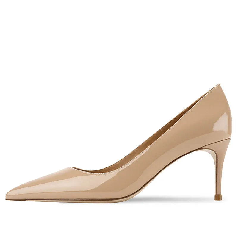 Women's black pointed toe slip-on pump with a kitten heel on a soft rubber sole.