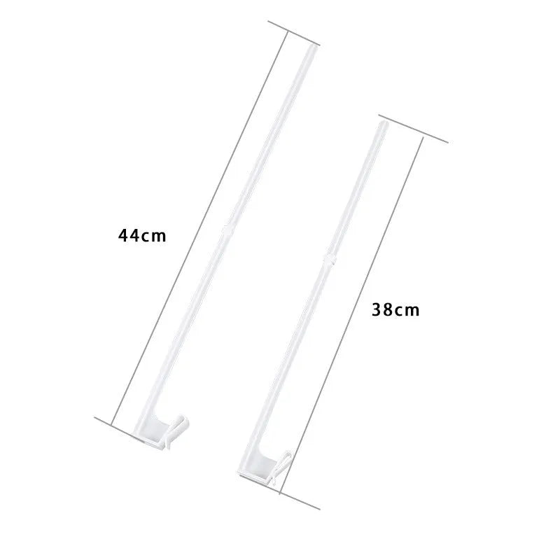 Ten white plastic car window flag pole clip mounts laid out on a surface.