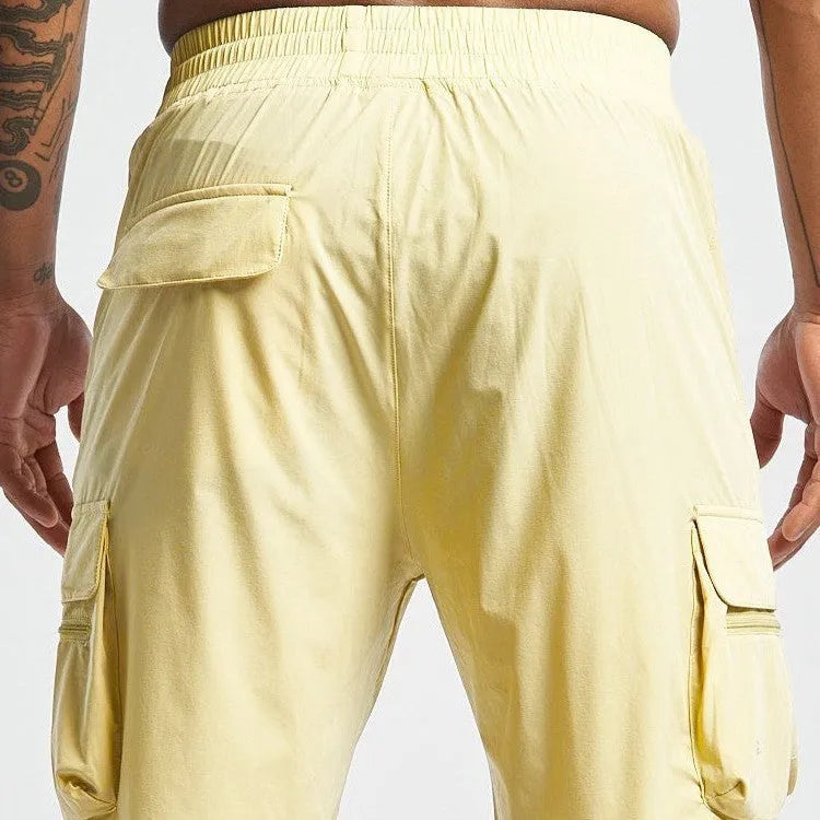 Men's black quick-dry sports shorts with elastic fabric for running and fitness activities