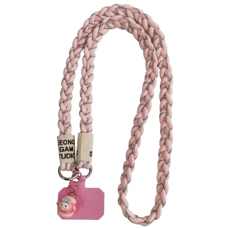 Woven nylon crossbody phone lanyard with macaron pendant in Pink Dot Gray, showing three-strand horse tail detail and matching clip.