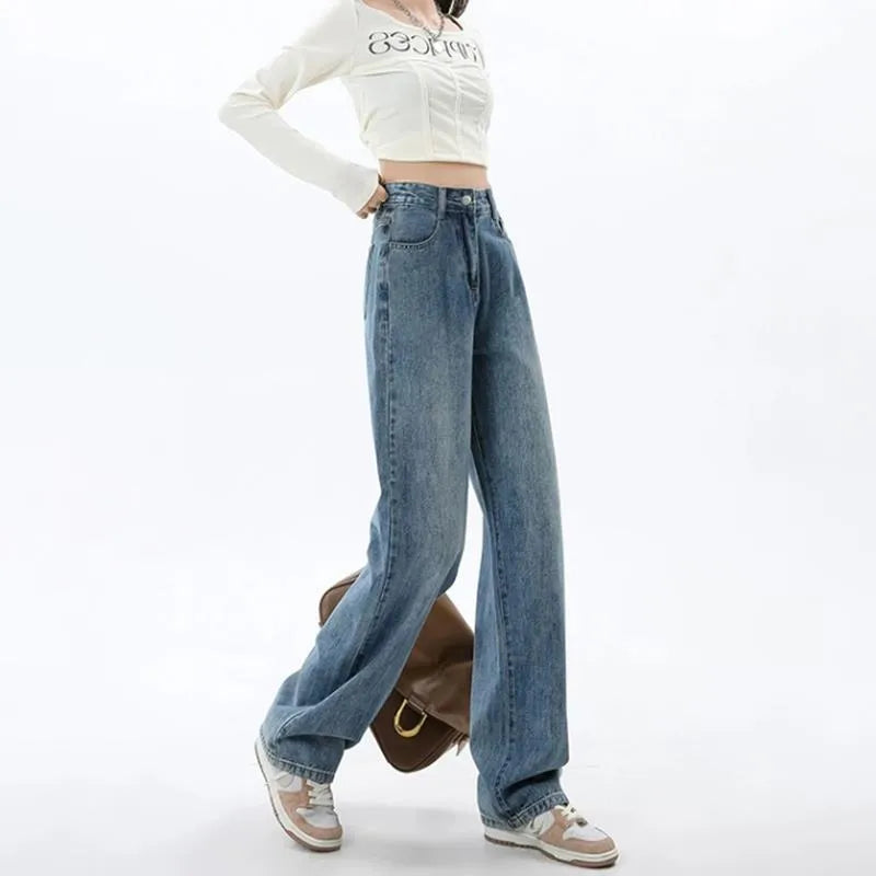 Women's retro blue high-waist wide-leg denim jeans laid flat