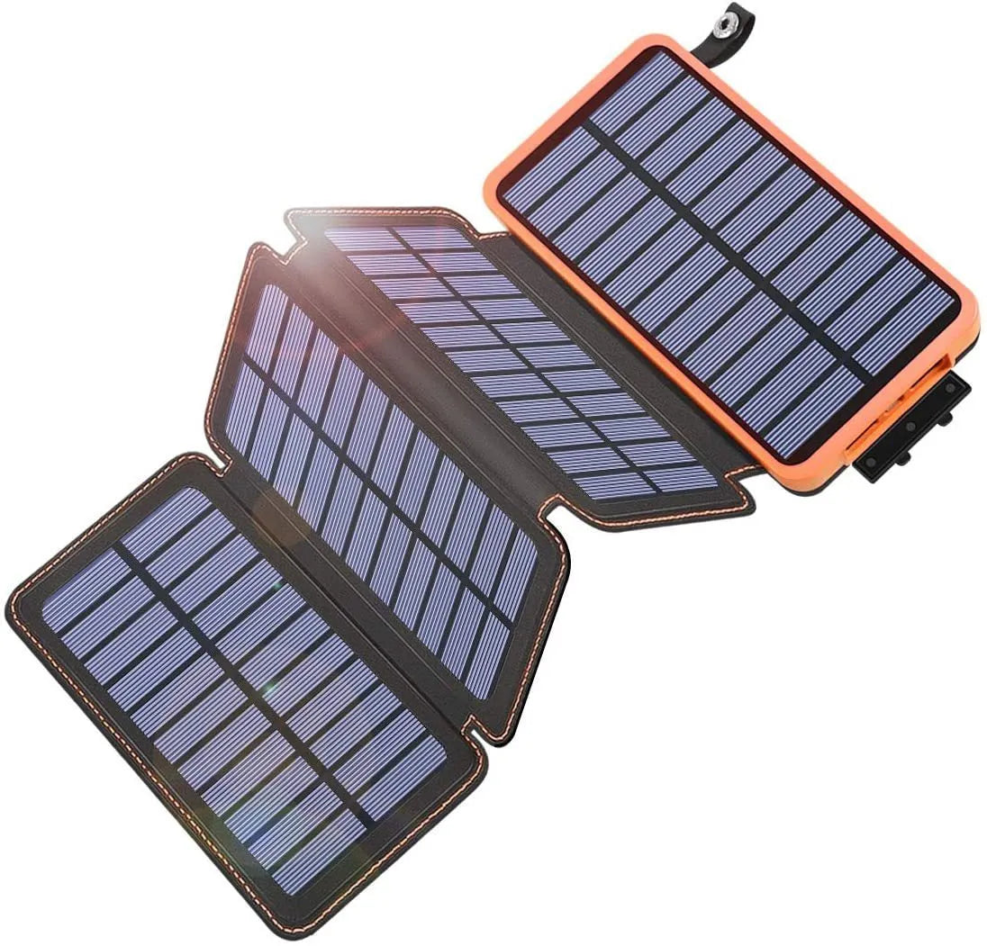 Black outdoor solar power bank with a solar panel, USB ports, and an LED light on a soft leather exterior.