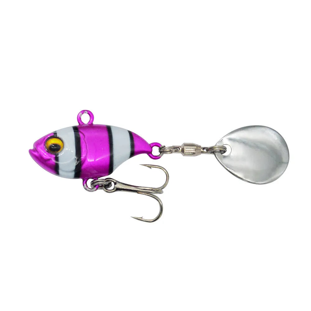 Metal fishing lure with a rotating sequin in a selection of colours on a blue background.