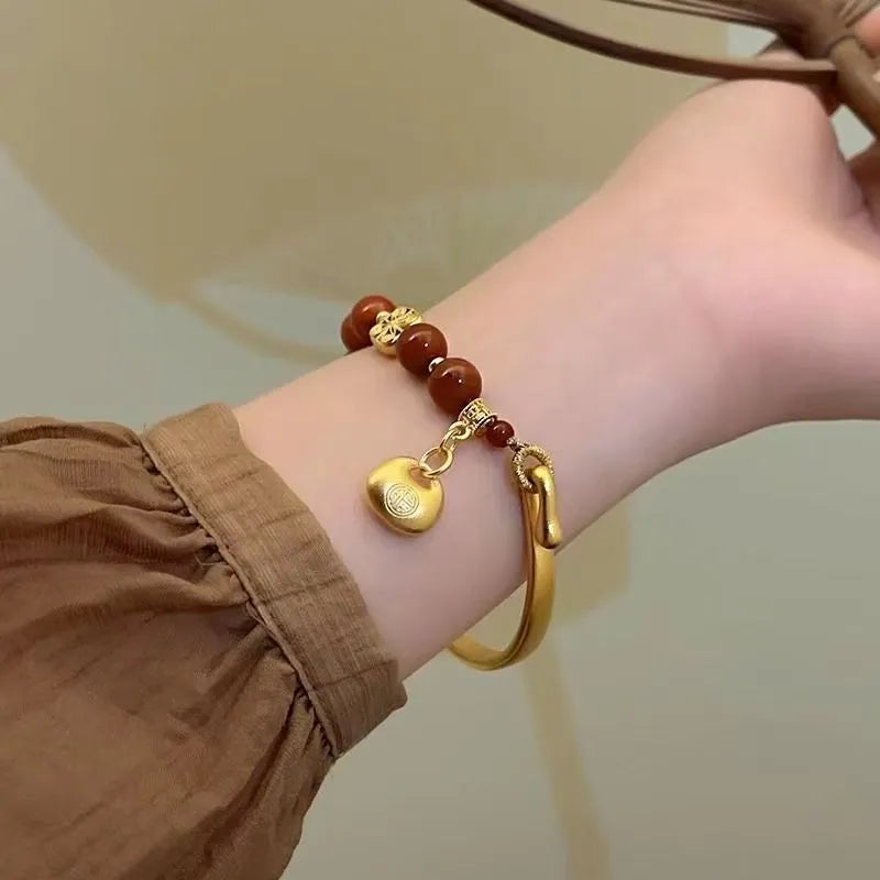 Golden South Red Agate character ingot half bracelet for women in antique style.