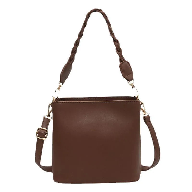 Retro style woven PU one-shoulder crossbody bucket bag in khaki colour.