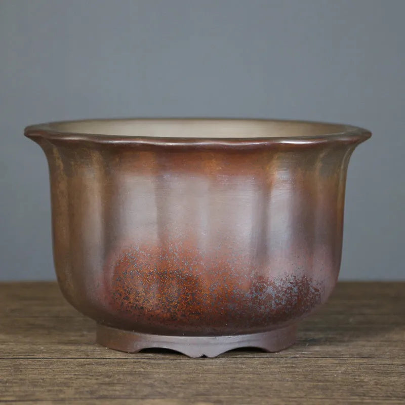 Indoor antique carved purple sand ceramic bonsai pot in large size with wood-grain finish.