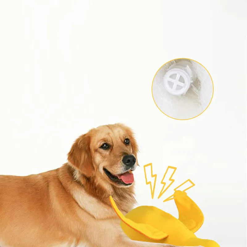 Yellow teddy dog toy with duck sound mechanism and food leak holes for treat dispensing